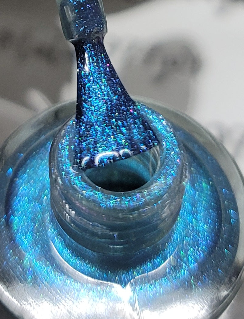 Into The Pit looks blue in the bottle loaded on brush