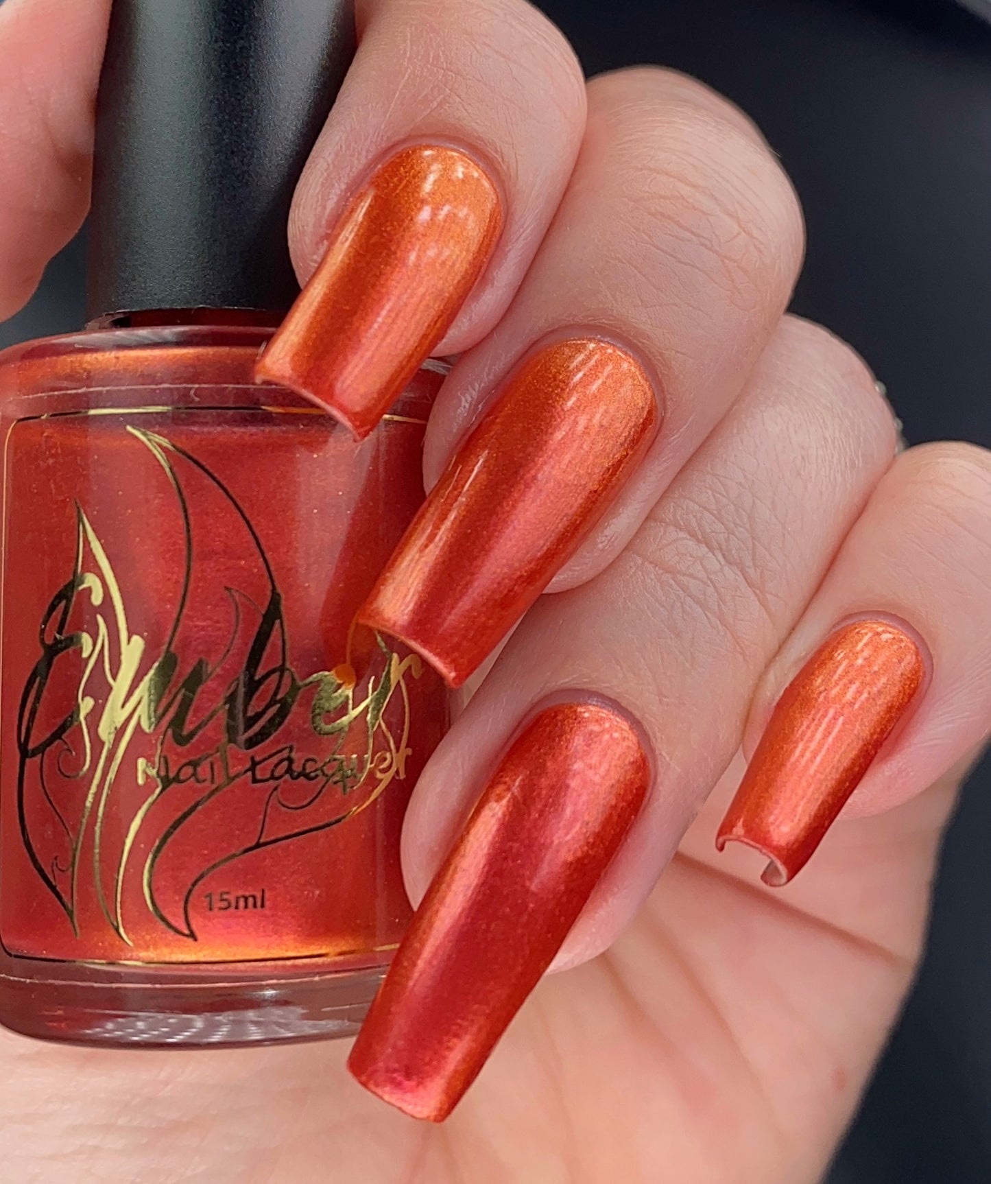 stunning effect of Flys Open coral pink and gold duotone on long nails