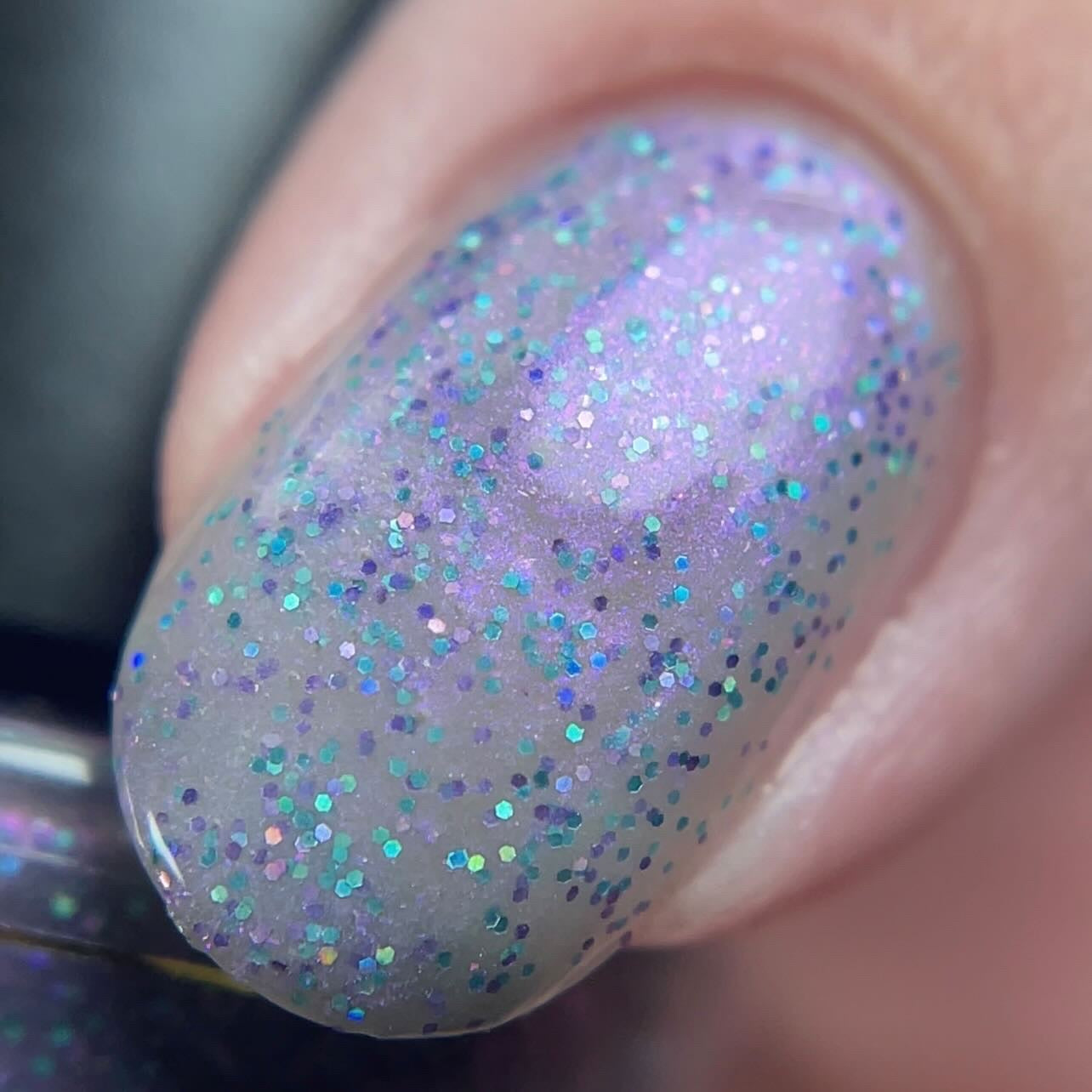 warm shading of Broken Ankle shows off glitter plus blue, turquoise and pink holographic flakes