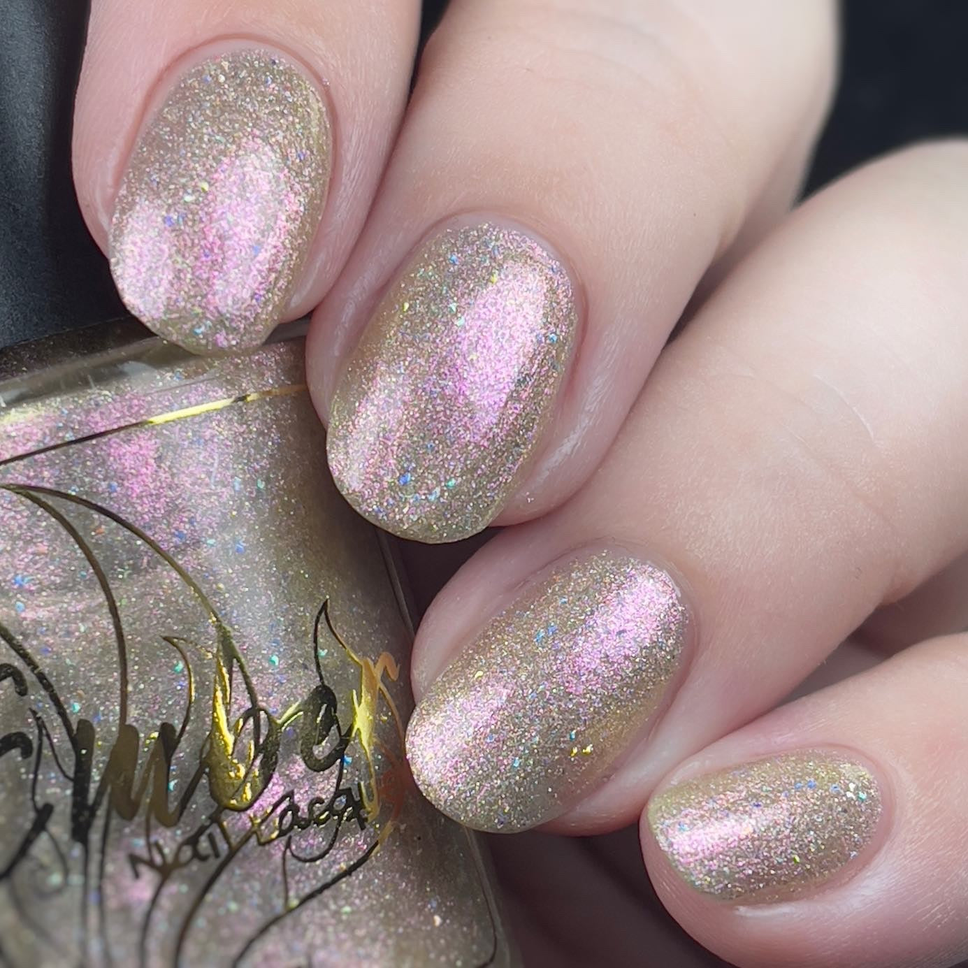 short nails get attention too with Back Flip Nude's gold glitter and pink holographic surprise