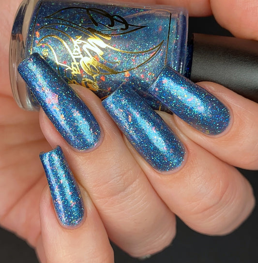 Plumber's Crack dark blue base with tons of glitter and unexpected pearly pink flakes