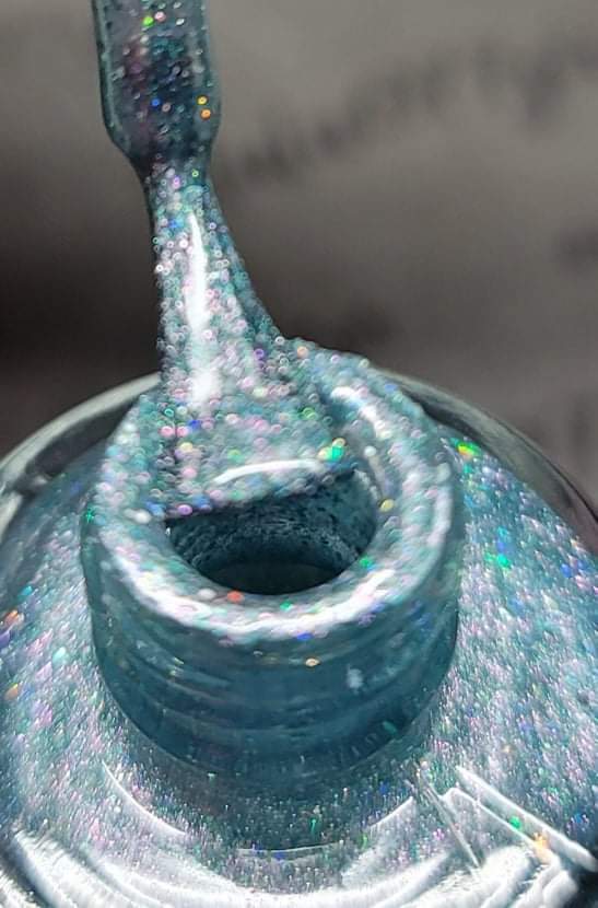 brush loaded with blue base from bottle - look at all that glitter
